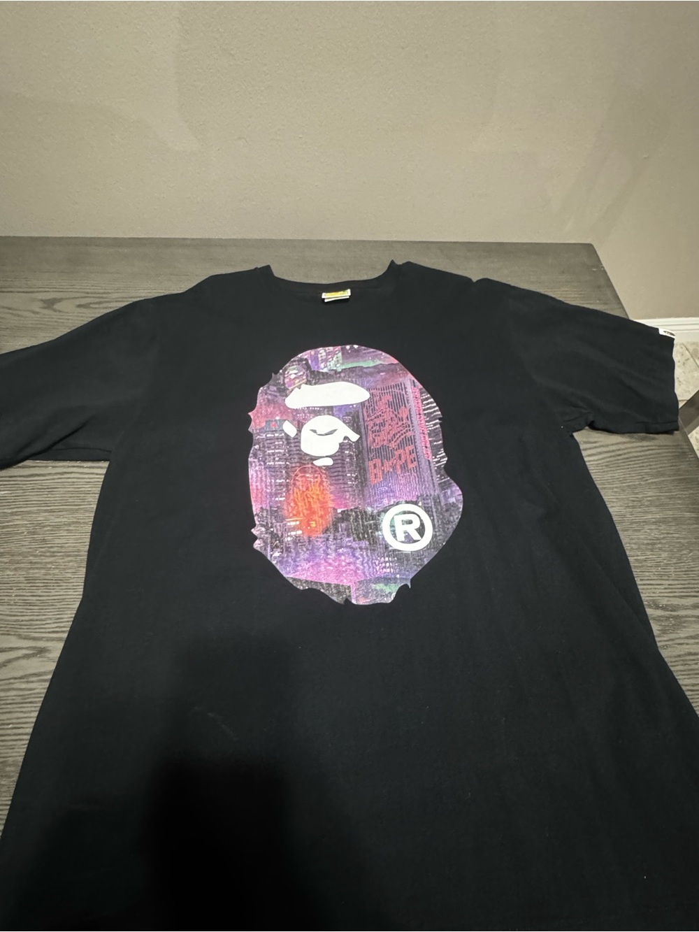 Bape Black Graphic Tee with Multicolor Ape Logo